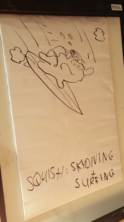 We were treated to a live drawing session! Here's Squish skydiving AND surfing at the same time.